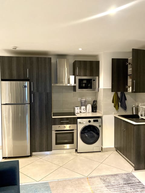 Deluxe Duplex | Private kitchen | Fridge, microwave, oven, dishwasher