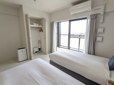 City Twin Room | Premium bedding, blackout drapes, soundproofing, free WiFi