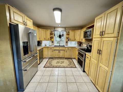 The spacious kitchen offers plenty of counter space for meal prep