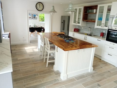 Kitchen leads thru to dining room