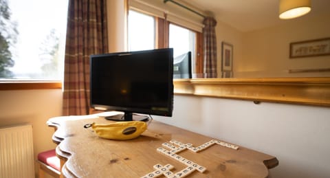 Pine Ridge Lodge TV in bedroom