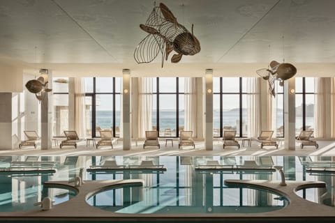 Indoor pool, outdoor pool, open 8:00 AM to 8:00 PM, lifeguards on site