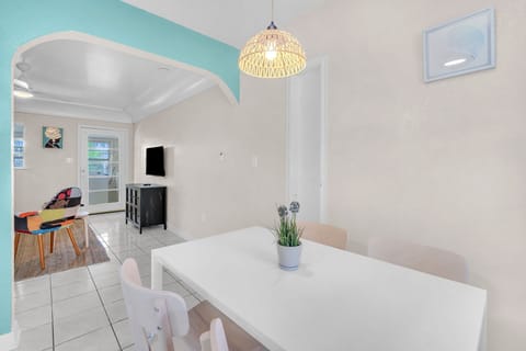 Dining table provides a cozy setting for your meals and can comfortably accommodate up to four people.