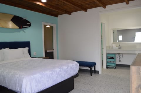 Deluxe Room, Multiple Beds | Bathroom | Shower, free toiletries, hair dryer, towels