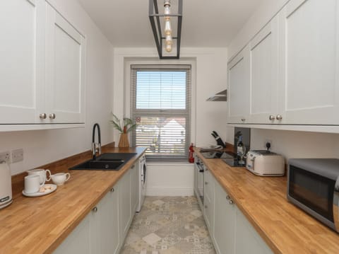 Fridge, dishwasher, electric kettle, toaster