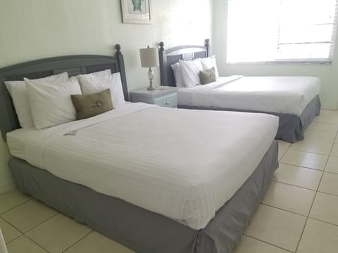 Double Room, 2 Queen Beds, Kitchenette | Free WiFi, bed sheets