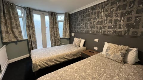 Quadruple Room, Ensuite (Double and Two Single Bed)