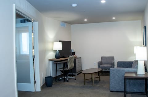 Suite, 1 King Bed | In-room safe, desk, laptop workspace, iron/ironing board