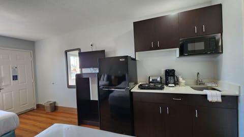 Deluxe Room, 2 Queen Beds, Accessible, Non Smoking | Private kitchen | Full-size fridge, microwave, stovetop, coffee/tea maker