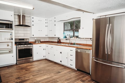 Tons of counter space, coffee maker, toaster, Microwave, and Air Fryer, Dishes