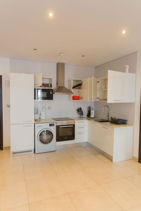 Luxury Apartment, 2 Bedrooms | Private kitchen | Full-size fridge, microwave, oven, stovetop