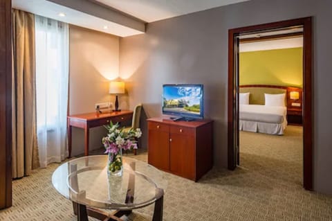 Suite, 1 King Bed | In-room safe, desk, iron/ironing board, free WiFi