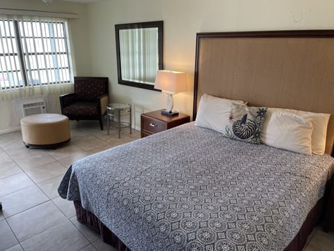 Standard Room, 1 King Bed, Partial Ocean View | Free WiFi, bed sheets