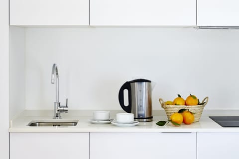 Suite | Private kitchenette | Espresso maker, coffee/tea maker, electric kettle, highchair