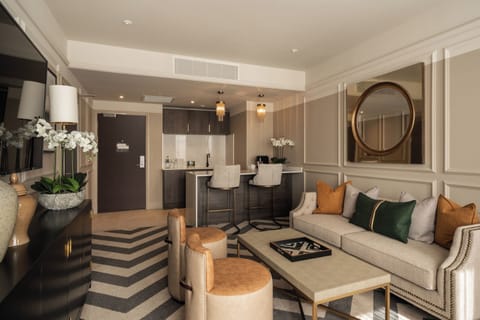 Signature Suite | In-room safe, individually decorated, desk, laptop workspace