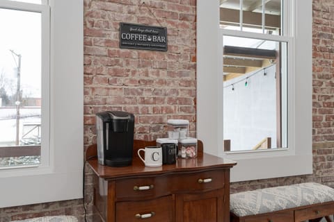 Get your day started at our coffee bar. Here, you'll find Keurig k-cups, large mugs, creamer, sugar.