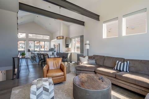 You'll love the open floor plan on the main level that leads from the living room into the dining room & kitchen