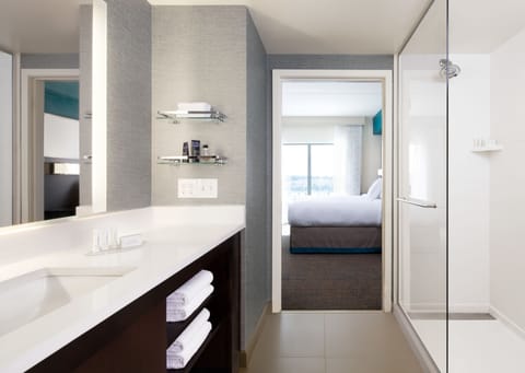 Suite, 2 Bedrooms | Bathroom | Free toiletries, hair dryer, towels