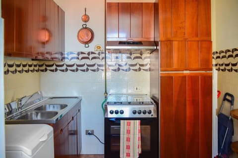 Apartment | Private kitchen | Full-size fridge, oven, stovetop, espresso maker