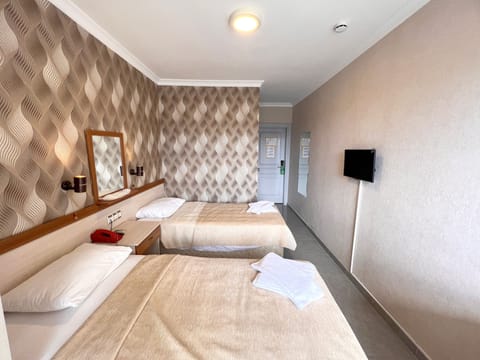 City Twin Room | Minibar, blackout drapes, free WiFi, bed sheets