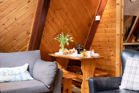 Wolf Lodge with dining table and couch