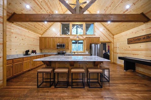 A massive open kitchen has everything ready at your fingertips to prepare meals during your stay at The Lodge by Boutiq.
| The Lodge by Boutiq Luxury Vacation Rentals | Broken Bow, Oklahoma