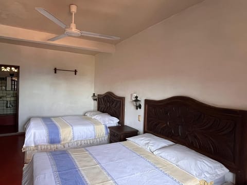 Basic Quadruple Room, Balcony, Ocean View | Free WiFi, bed sheets