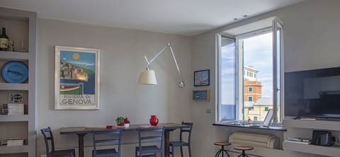 Apartment, 1 Bedroom | Living area | 35-inch flat-screen TV with digital channels, TV