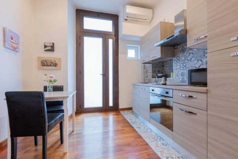 Apartment | Private kitchen | Full-size fridge, microwave, stovetop, electric kettle