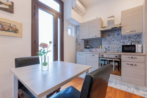 Apartment | Private kitchen | Full-size fridge, microwave, stovetop, electric kettle