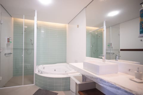 Superior Triple Room, Jetted Tub | Bathroom | Designer toiletries, hair dryer, towels, soap