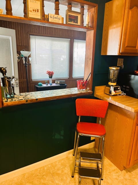 Kitchen - new water cooler replaces red step chair.