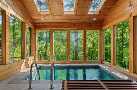 Escape to this cabin and immerse yourself in luxury with its private, heated pool—perfect for unwinding.