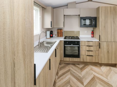 Fridge, electric kettle, toaster, cookware/dishes/utensils