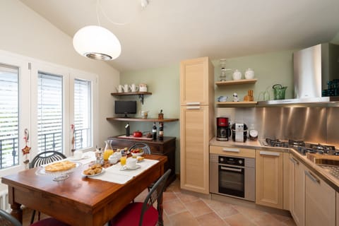 Villa | Private kitchen | Full-size fridge, microwave, oven, stovetop
