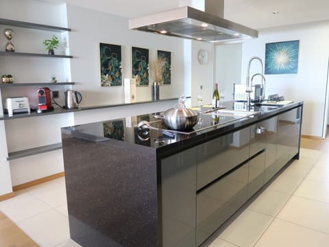 Countertop, Cabinetry, Property, Tap, Kitchen, Wood, Sink, Flooring, Kitchen Appliance, Floor