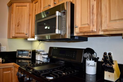 Enjoy cooking in on this gas stove.  This home boasts upgraded appliances and beatiul countertops!