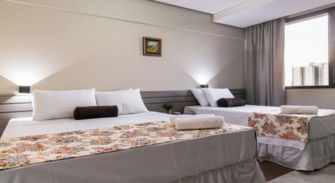 Deluxe Room | Hypo-allergenic bedding, in-room safe, individually decorated