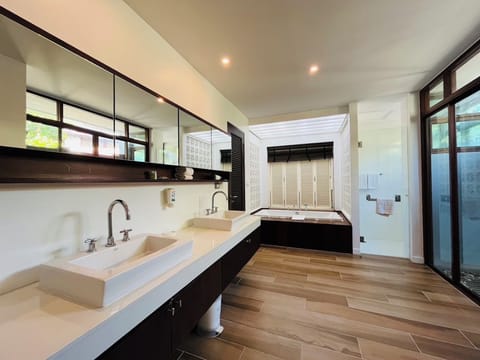 Villa, 4 Bedrooms | Bathroom | Separate tub and shower, rainfall showerhead, free toiletries
