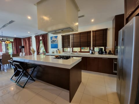 Villa, 4 Bedrooms | Private kitchen | Full-size fridge, microwave, oven, stovetop