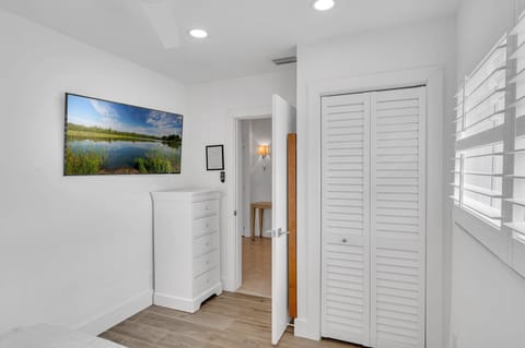 The third bedroom has a King bed and features a smart T.V.