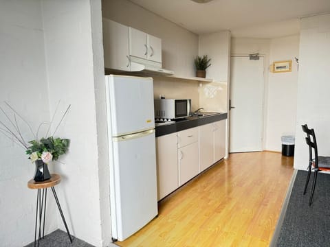 Two Bedroom Suite | Private kitchen | Fridge, electric kettle