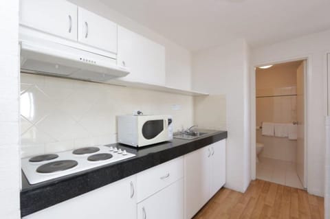 One Bedroom Apartment | Private kitchen | Fridge, electric kettle