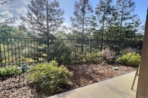 Central patio, surrounded by private trees and stunning olive orchard view—perfect for quiet moments