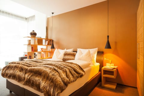 Signature Suite, 2 Bedrooms, Sauna, Ground Floor (Ground Floor DL) | Hypo-allergenic bedding, free minibar items, in-room safe