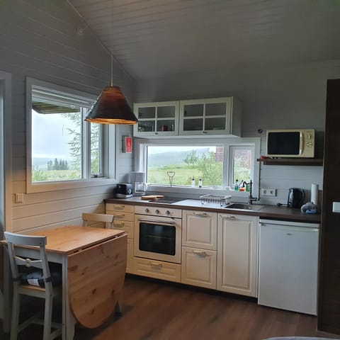 Cottage, 1 Bedroom | Private kitchen | Fridge, microwave, stovetop, coffee/tea maker