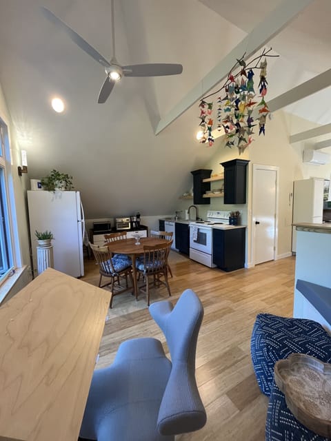 Fully equipped kitchen and dining. Separate work space.