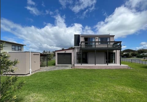 Utility room on left has second shower, toilet and laundry.