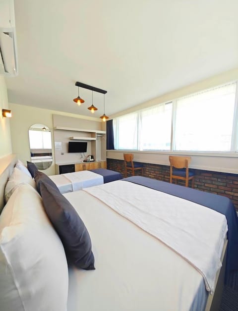 Standard Room | Living area | 30-inch LED TV with premium channels, TV, computer monitors