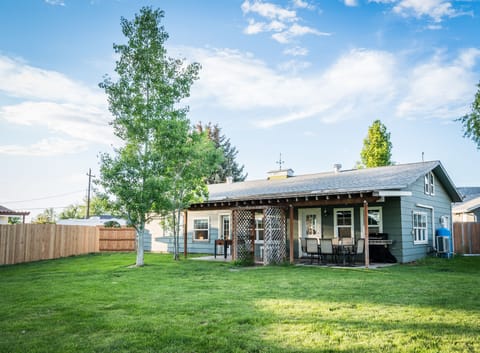 Large fenced backyard and covered patio